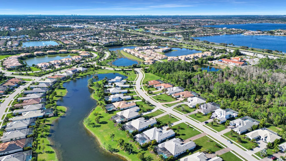 Aerial view of LaMorada community and lake in North Naples Florida