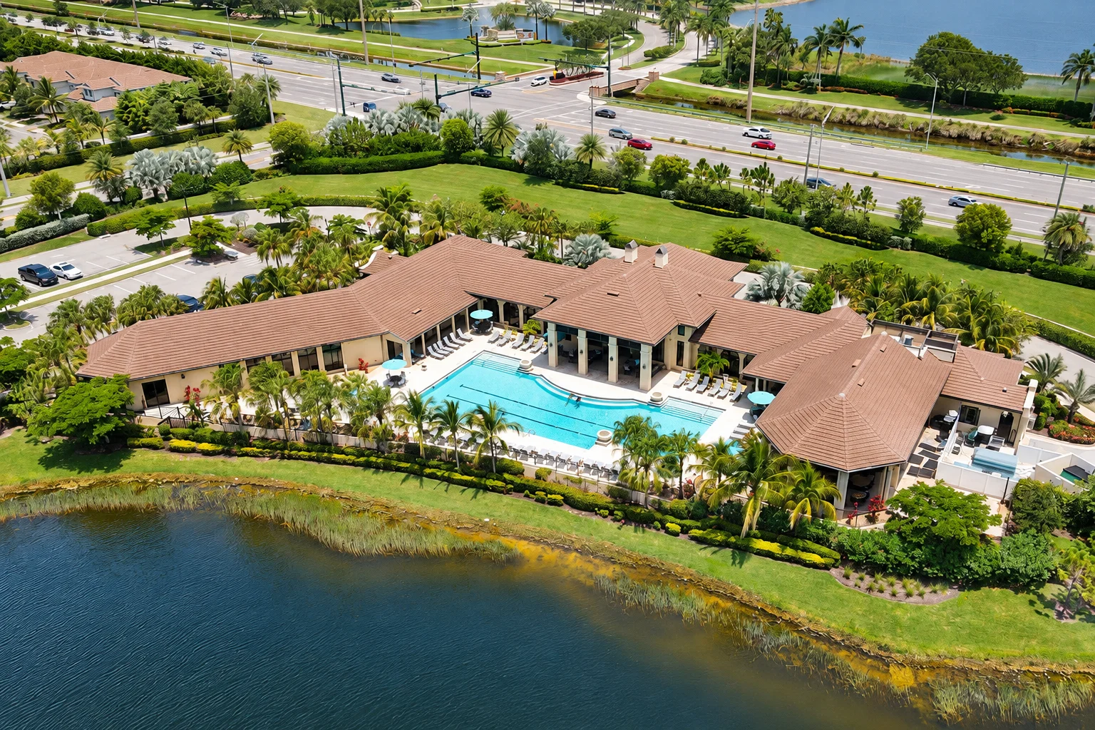 Aerial view of Club LaMorada and outdoor amenities in North Naples Florida